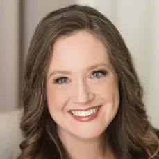 A profile picture of Christine Tucker.
