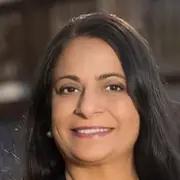 A profile picture of Mona Singh.