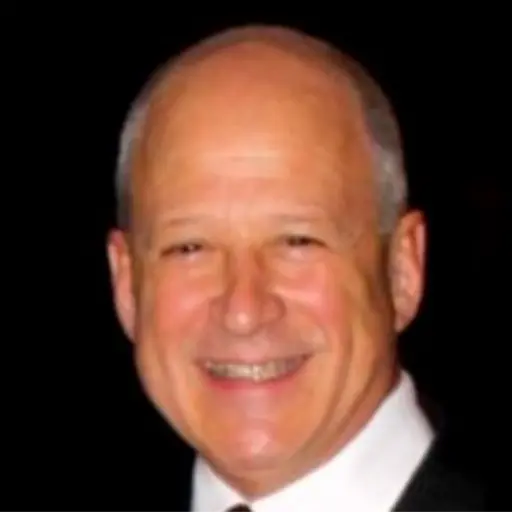 A profile picture of Mark E. Lehman.