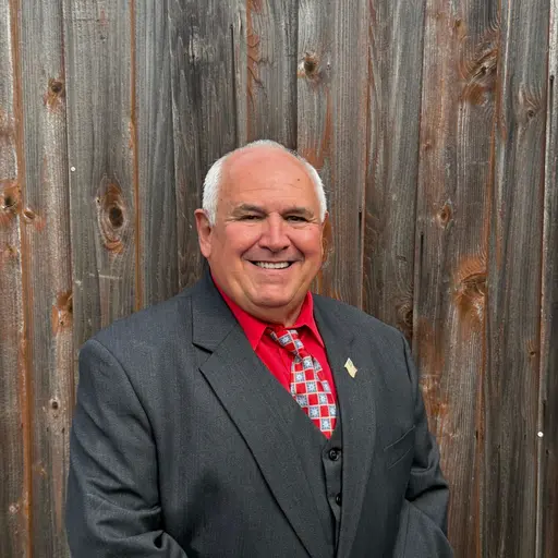 A profile picture of Greg Ziglar.