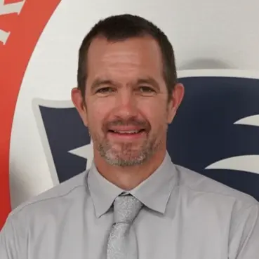 A profile picture of Brandon K. Whitaker.