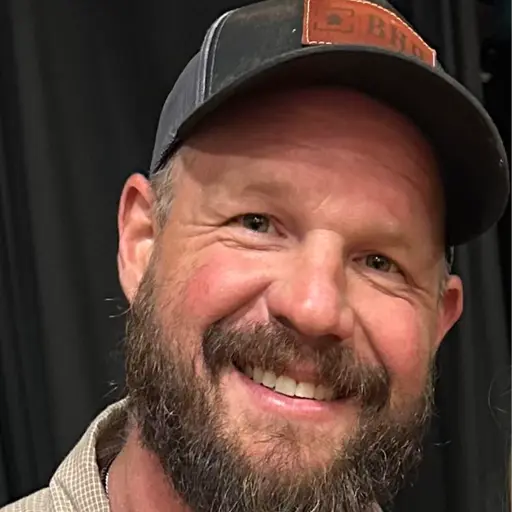 A profile picture of Adam Yelton.