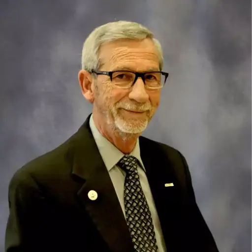 A profile picture of Terry M. Bennett.