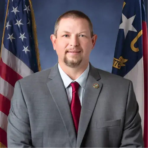 A profile picture of Brian E. Kirkland.