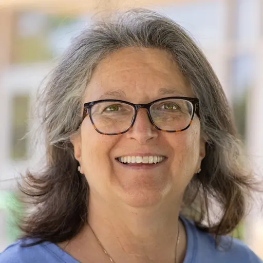 A profile picture of Jacqui Smith Watson.