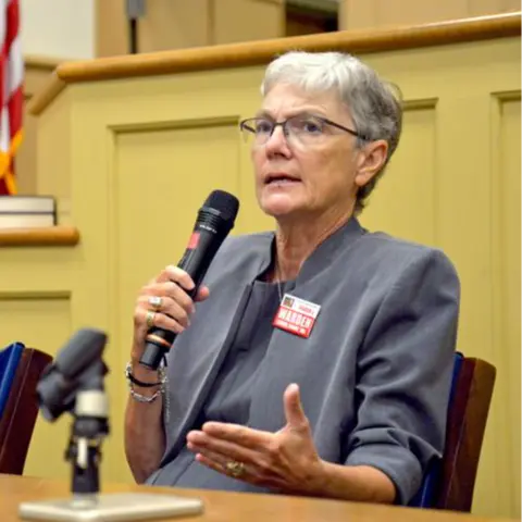 A profile picture of Sharon J. Warden.