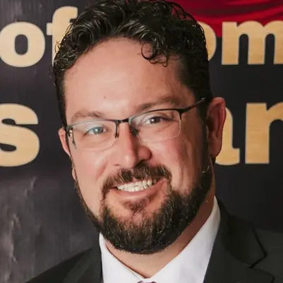 A profile picture of Christopher Joel Reed.