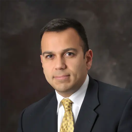A profile picture of Ralph Alvarado.