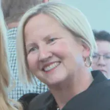 A profile picture of Rebecca Adams Simpson.