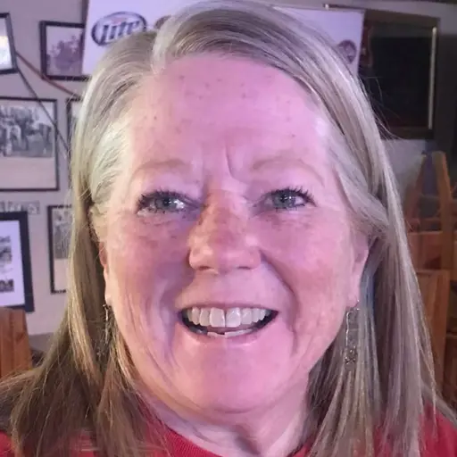 A profile picture of Debi Sanning.