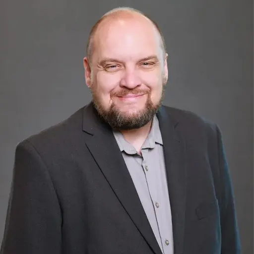 A profile picture of Troy Kirby.