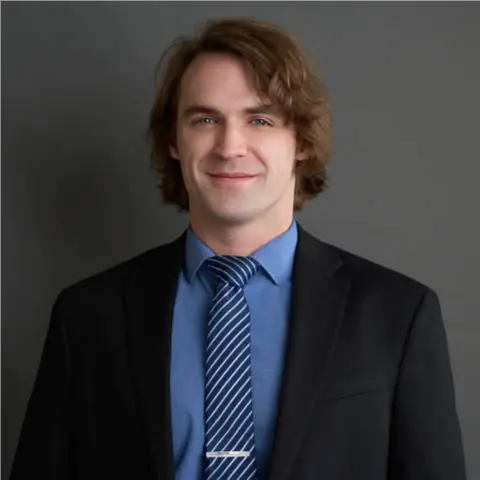 A profile picture of Garrett Cady.