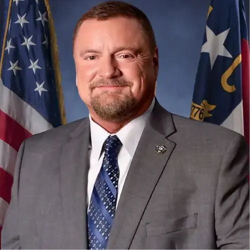 A profile picture of Burnis Wilkins.