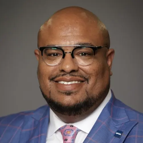 A profile picture of Carlos Riddick.