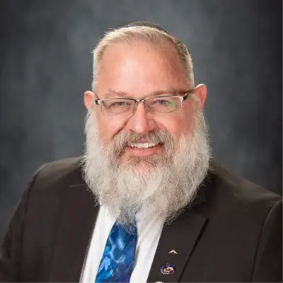A profile picture of Brian K. Lewis.