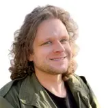 A profile picture of Greg Stoker.