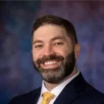 A profile picture of Tim Downing.