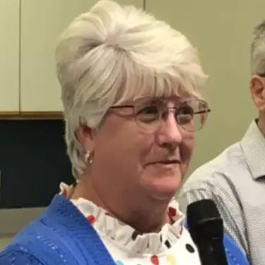 A profile picture of Paula Hughes Graszus.