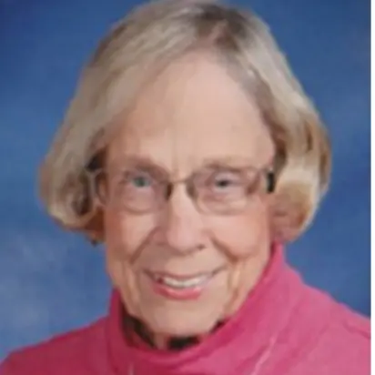 A profile picture of Kate Kirwan Greer.