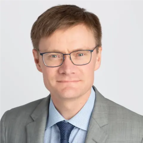 A profile picture of Ian Birk.