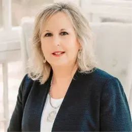 A profile picture of Teresa Huddleston.