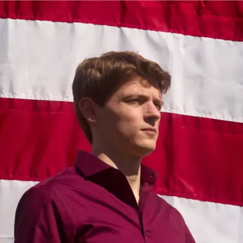 A profile picture of Nathan Wood.